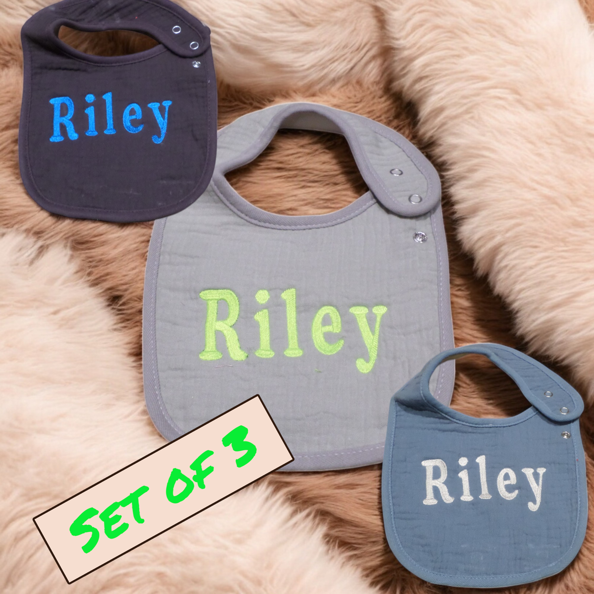 Close-up of a personalized embroidered baby bib showcasing durable stitching and vibrant colors.