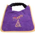 dog bib with swirly christmas tree design and personalized with name