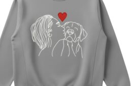 woman kissing dog sweatshirt